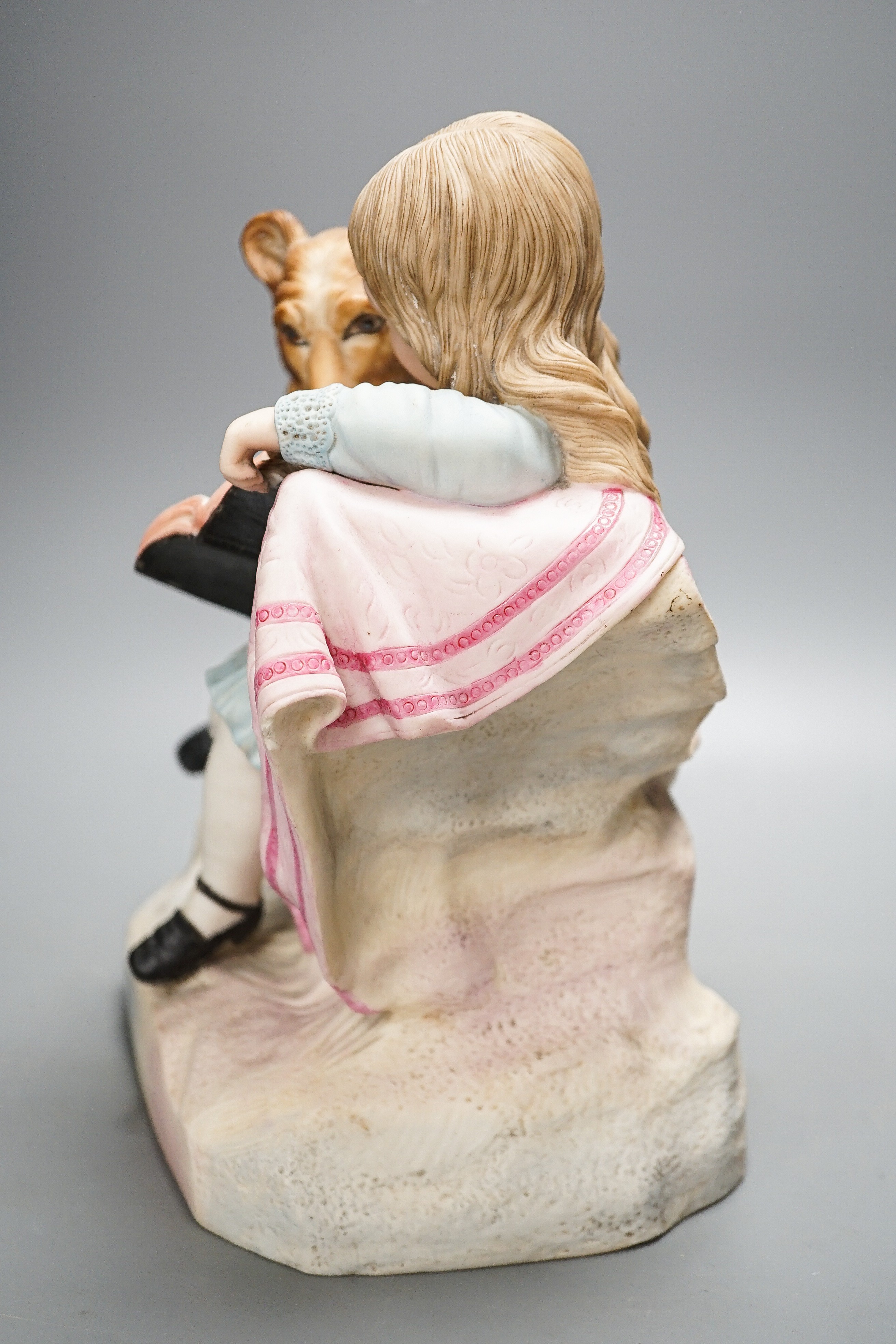 A late 19th Century Robinson & Leadbeater parian ware group ‘You Can’t Read’, 28 cms high.